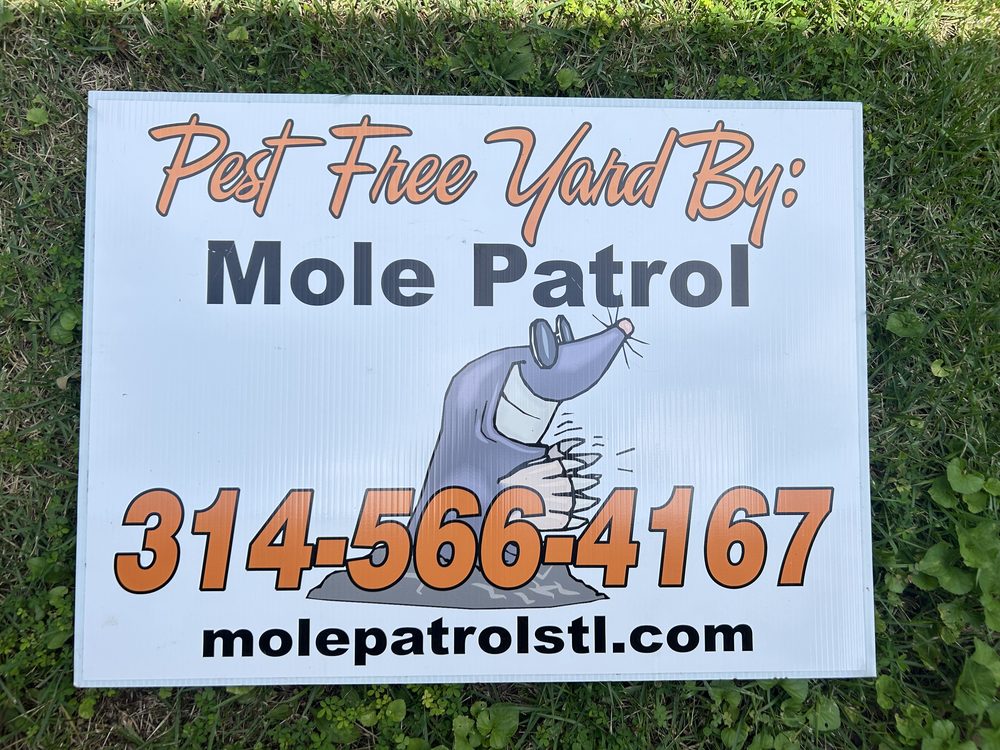 Mole Patrol yard sign — 314-566-4167, molepatrolstl.com